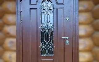 металлическая дверь в коттедж с отделкой коричневым МДФ, модель ДКТЖ-49, вид снаружи